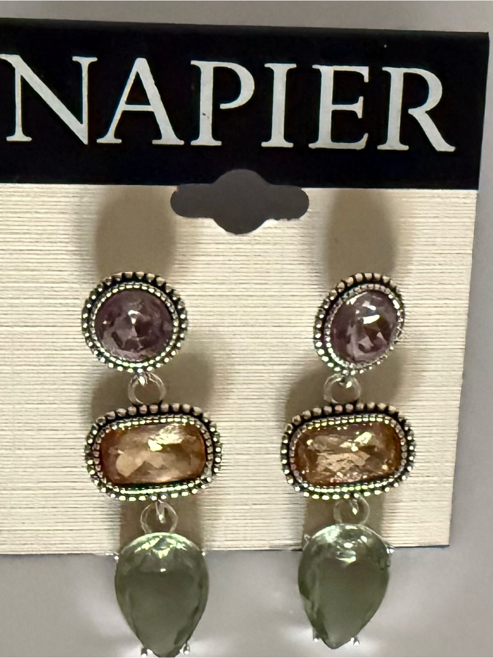 Napier NOC 3-tiered crystal dangle silver tone earrings.